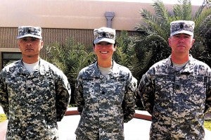 Pictured from left March 15 at Camp Arifjan, Kuwait, are Lt. Col. Averill Ruiz, Lt. Col. Tracy Andrews and Sgt. 1st Class Steven Horner. Not shown: Maj. Gregory Lundeberg.