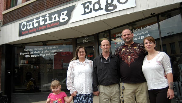 Meet the Cutting Edge family, from left, Isabella Little, Chris Little, Michael Little, Robert D. Barringer and Stacy Barringer.