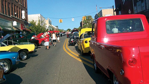 Main Street in downtown Niles is packed with cars during a past Bring It! Cruise in and Car Show event. The weekly summer series begins this Wednesday. Leader file photo 