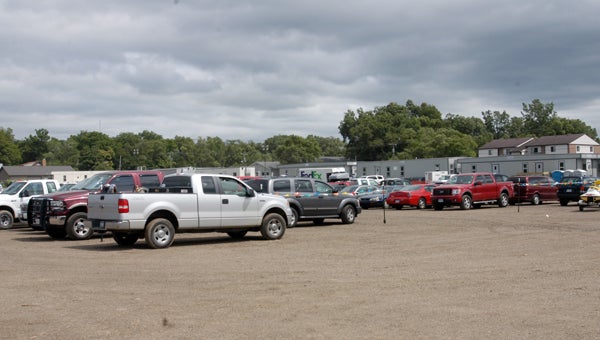 The once vacant lot that once housed the Eastgate Shopping Center on Oak Street is now filled with trailers, trucks and equipment for Enbridge’s pipeline replacement project. Leader photo/CRAIG HAUPERT 