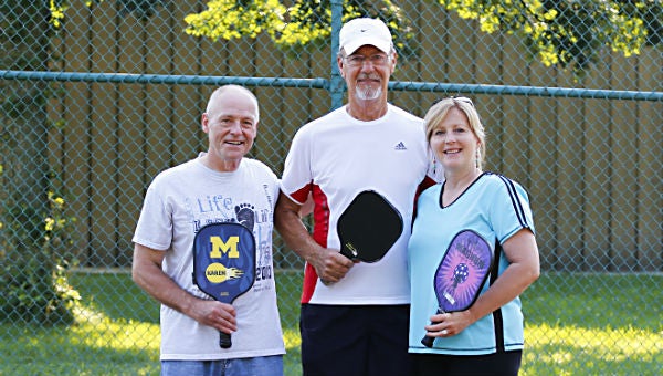 Pickleball courts are being built at Firemen’s Park in Niles Township. They are scheduled to be completed later this summer or early in the fall. Among those who have helped push the project forward are (from left) Art Tilbury, Myles (the Godfather) Nugent and Diana Clark. (Leader photo/ JAMI FUJAWA)