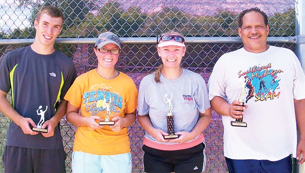 Sue Watson and Dave Negron, right, defeated Michael and Alyssa Robbins to win the Dowagiac City Tennis Tournament mixed doubles championship Saturday. (Leader photo/Provided)