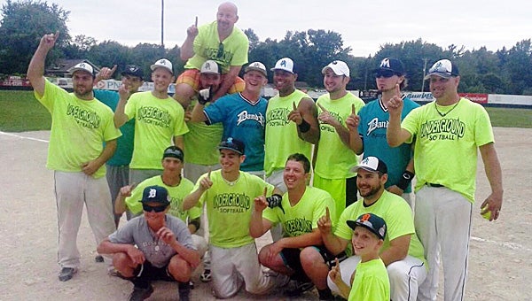 Members of the D&R Sports men’s slow-pitch softball team celebrate winning the ASA Class F state softball title last weekend in Muskegon. (Leader photo/Provided)