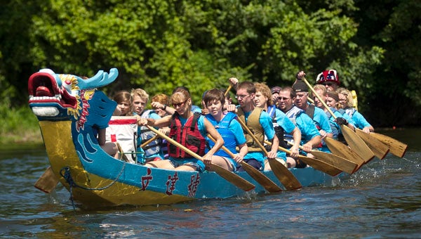 The Dragon's Wake team, pictured here, won the Dragon Boat races Saturday at Niles Riverfest. Photo by Joe Weiser
