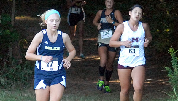 Niles’ Abigail Gaines is seen here running in the Viking Stampede Saturday. She helped the Vikings to a fourth place finish at the Big Hill Invitational Tuesday. (Leader photo/SCOTT NOVAK)