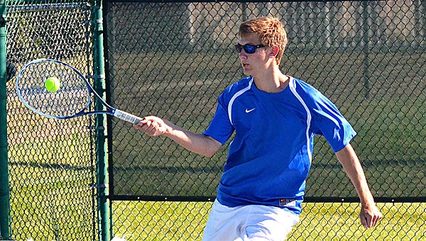 Edwardsburg’s Joe Queener returns a shot at No. 1 doubles for the Eddies against Coloma Monday. Edwardsburg defeated Coloma 6-2 in Wolverine Conference West action. (Leader photo/KELLY SWEENEY)