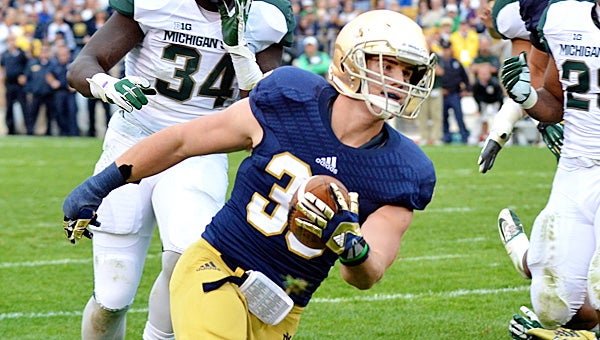 Notre Dame’s Cam McDaniel scored a late touchdown to help lift the Fighting Irish over Michigan State 17-13. (Leader photo/KELLY SWEENEY)