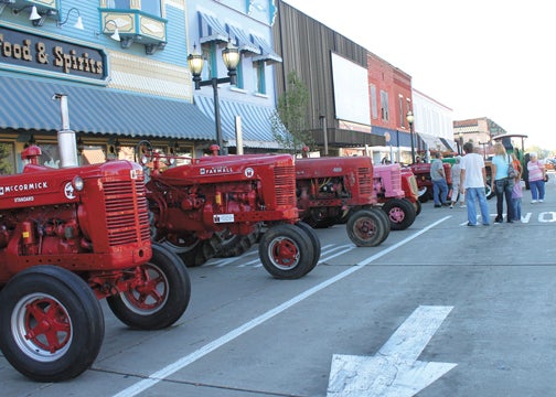 Area collectors showed off their restored tractors at the 2013 Under the Harvest Moon Festival this weekend in Dowagiac.  Leader Photo/AMBROSIA NELDON 