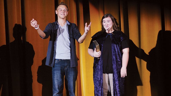 A.J. Bartkowiak and Katelyn Mueller narrate Niles High’s dress rehearsal Wednesday of “The Brother’s Grimm Spectaculathon." Leader photo/CRAIG HAUPERT