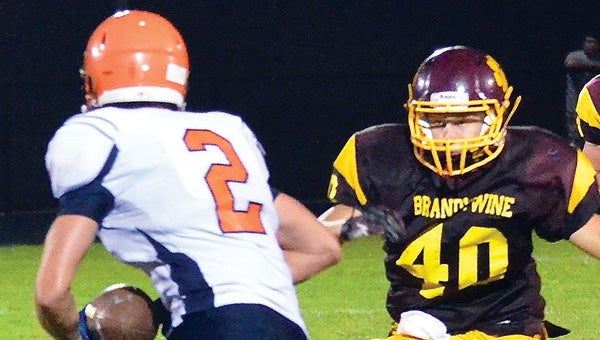 Trent Moskwinski (40) and the Brandywine defense will have their hands full tonight trying to stop Buchanan’s Doug Freeman. (Leader photo/File)