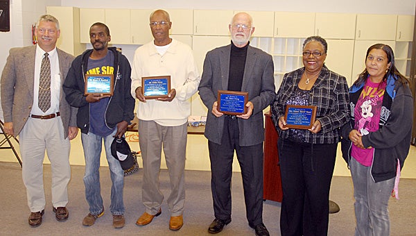 The Cassopolis Public Schools honored four men for volunteering their time for a student in need. From left are Superintendent Tracy Hertsel, Bryan Beathea, Eddie Mose, Dave Kring, the Rev. Robert “Butch” Reed (represented by his wife Rita) and Paula Gilliam, whose son was helped through the Community Initiative Program. Missing from photo are Tony Pompey, Leddrew “Peanut” Smith Jr. and William Steele. (Leader photo/SCOTT NOVAK)