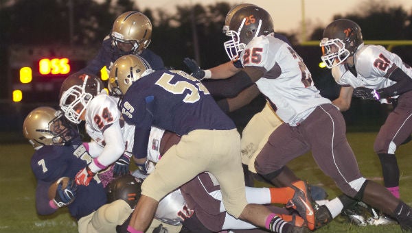 Niles' John Lewis (7) gets swarmed under by the Portage Northern defense Friday night. (Leader photo/JOSEPH WEISER)
