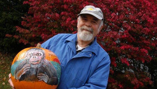 Joel Camp, of Niles, hand-painted this pumpkin and delivered it to the Niles District Library Monday afternoon. Camp has been donating pumpkins to the library for years.