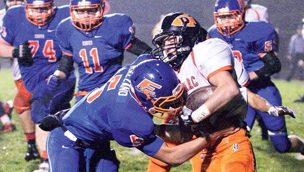 The Dowagiac football team will have to display the same passion and desire it did against Edwardsburg in the opening round of the playoffs if it wants to bring home a district title tonight. (Leader photo/File)