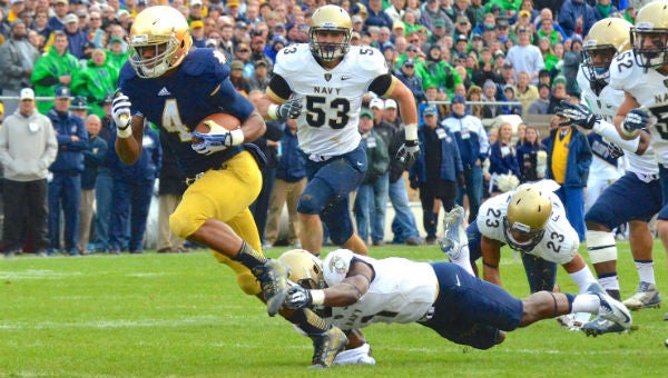 Notre Dame's George Atkinson III heads to the end zone against Navy Saturday. (Leader photo/KELLY SWEENEY)