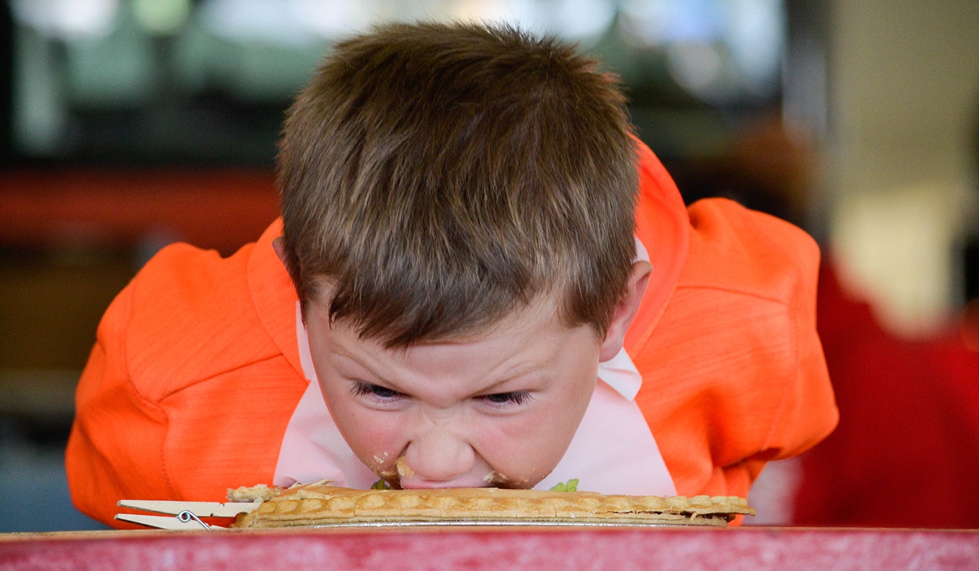 Apple pie eating contest Photo story Leader Publications Leader