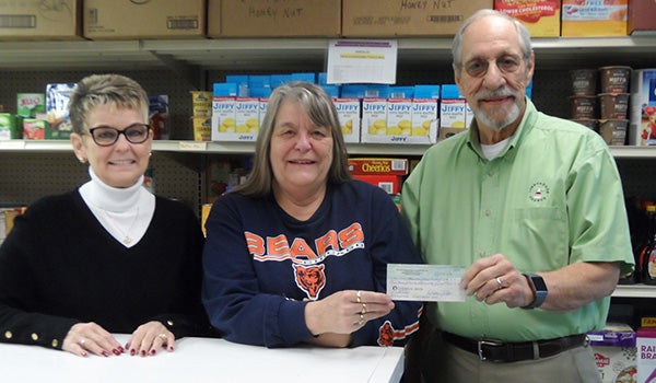 Lighthouse Chorus fundraiser presents checks to Edwardsburg Food Pantry ...